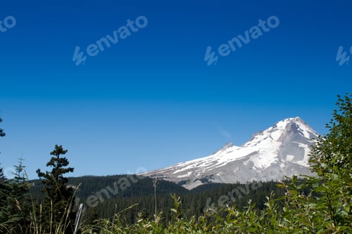 Preview: High Mountain In Oregon With Snow In A Clear Late Summer Day