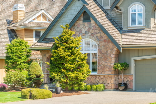 Preview: Fgrament Of Beautiful Exterior Of Newly Built Luxury Home. Yard With Green Grass And Landscape.