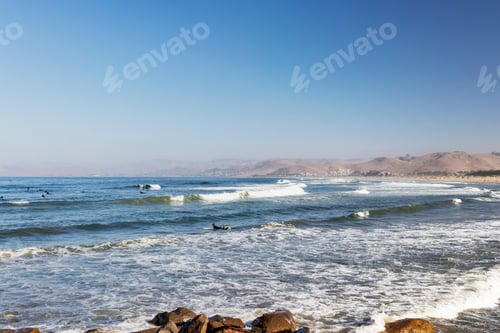 Preview: Many Surfers Catching Waves In The Morning On The West Coast
