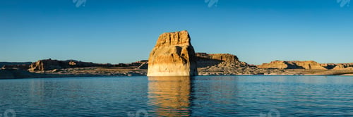 Preview: Lone Rock In Lake Powell Near Sunset On A Calm Evening With Serene Blue Waters