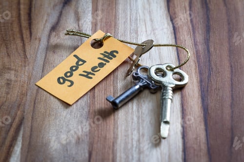 Preview: Concept For A Happy Life Using An Old Decorative Key And A Hand Written Tag Attached By A Golden