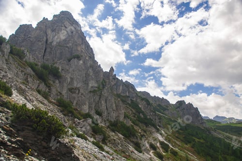 Preview: Beautiful Rocky Peak Surrounded By Treas And Forest On A Beautiful Sunny Day. Shot In Innsbruck