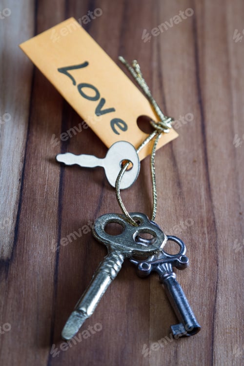 Preview: Concept For A Happy Loving Life Using Old Decorative Keys And A Hand Written Tag Attached By A