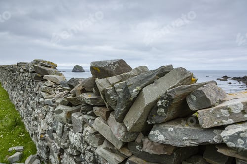 Preview: View Towards A Dry Stone Wall In Green Grass In The North West Of Scotland Near Durness And Fanaid