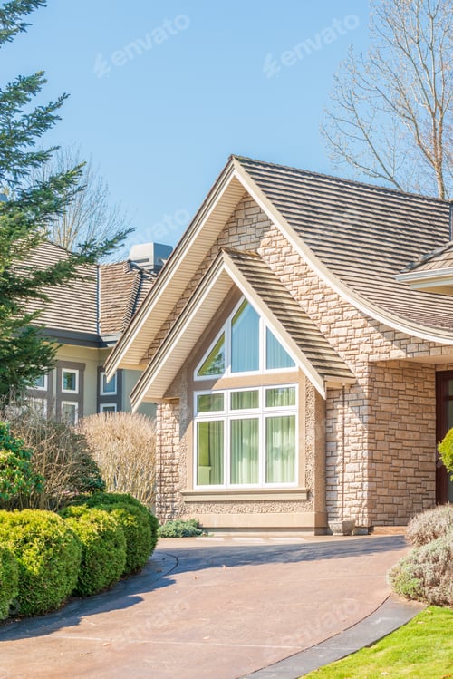 Preview: Fgrament Of Beautiful Exterior Of Newly Built Luxury Home. Yard With Green Grass And Landscape.