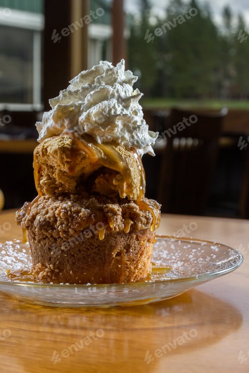 Preview: Layered Dessert Consisting Of An Apple Cake Topped With Salted Caramel Ice Cream And A Dollop Of