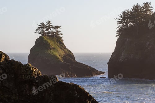 Preview: Beautiful Landscape Classic Of The Oregon Coast With Islets Topped With Evergreen Trees And A Light