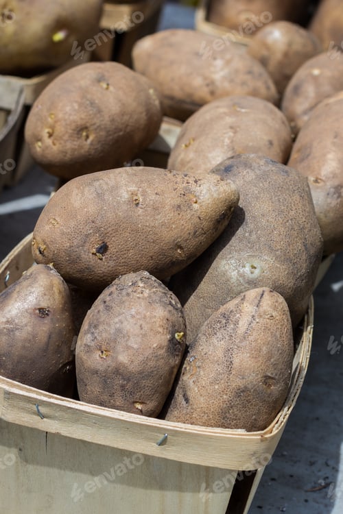 Preview: Small Wooden Boxes Filled With Potatoes For Sale At The Local Farmers Market