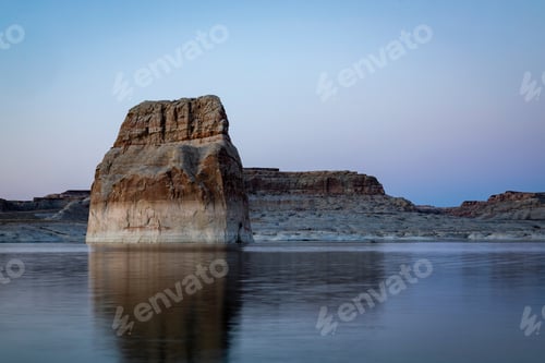 Preview: Lone Rock In Lake Powell Near Sunset On A Calm Evening With Serene Blue Waters