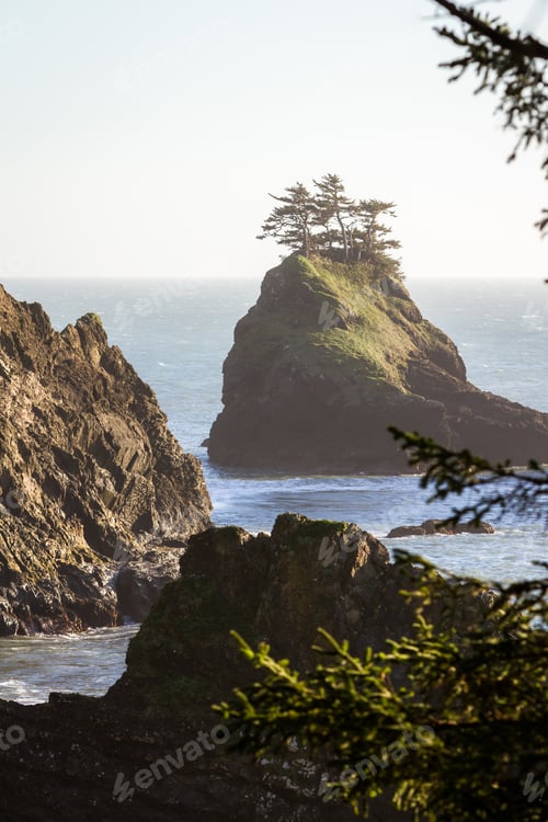 Preview: Beautiful Landscape Classic Of The Oregon Coast With Islets Topped With Evergreen Trees And A Light