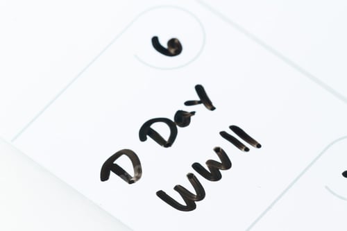 Preview: Close Up Of A Daily Planner Or Calendar With A Hand Written Message For A Remembering Of D Day