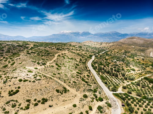 Preview: View Of Country Road Along The Bush Growing Over The Crete Landscape