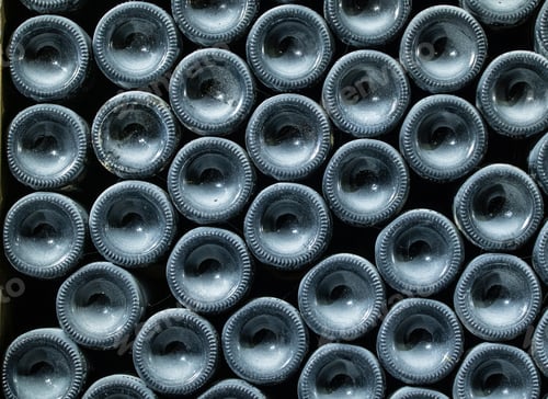 Preview: Stacks Of Wine Bottles Laying Flat In Wooden Racks In Old Wine Cellar Or Cave