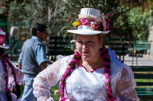 Preview: Ollantaytambo, Peru - May 16 : Religious Celebration For Fiestas De Pentecostes With People Wearing