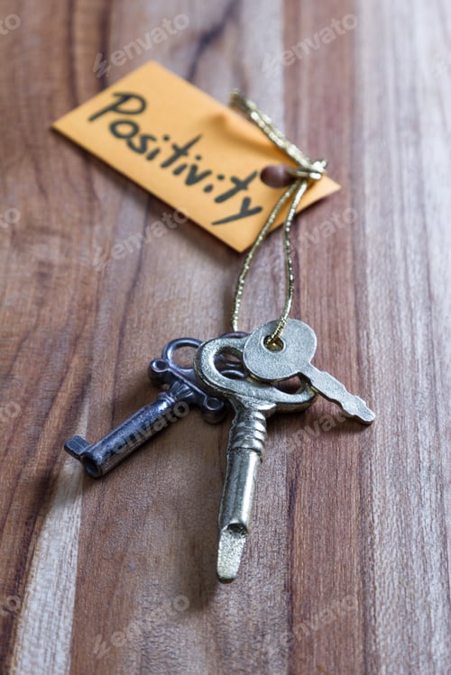 Preview: Concept For A Happy Positive Life Using Old Decorative Keys And A Hand Written Tag Attached By A