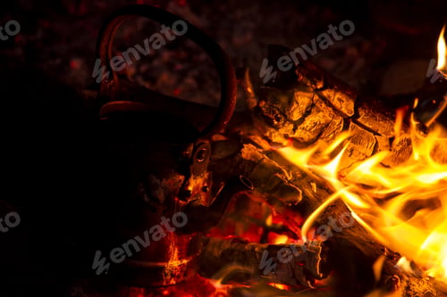 Preview: Kettle On The Fire At Night To Boil Some Water