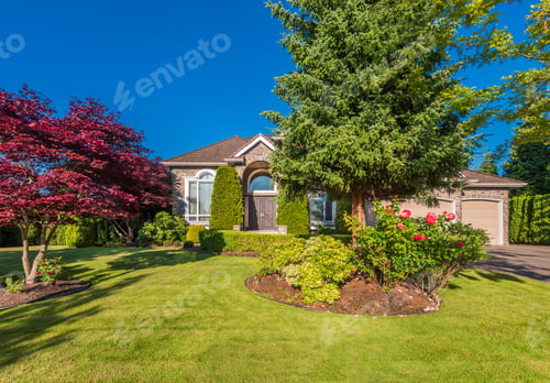 Preview: Beautiful Exterior Of Newly Built Luxury Home. Yard With Green Grass And Walkway Lead To Front