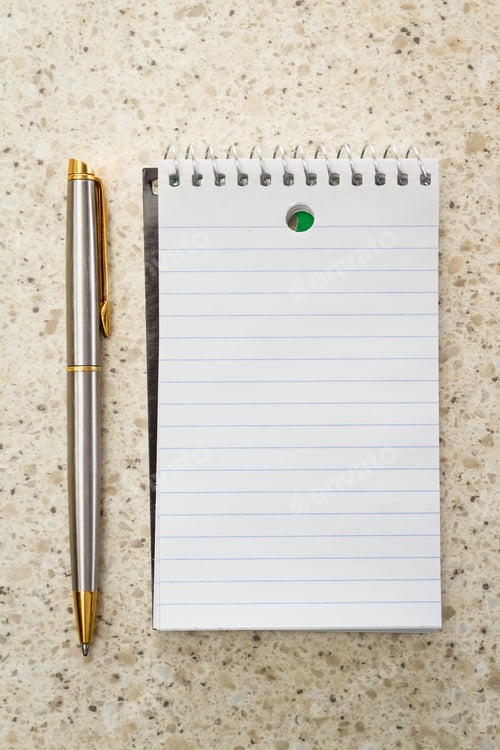 Preview: Close Up Of A Small Note Pad And A Pen As A Reminder Concept