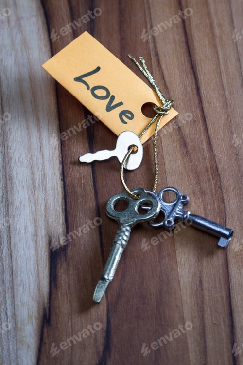 Preview: Concept For A Happy Loving Life Using Old Decorative Keys And A Hand Written Tag Attached By A