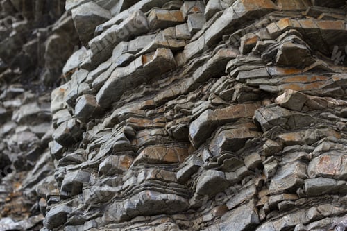 Preview: Close Up Of A Large Rock On The Coast Composed Of Multiple Layers