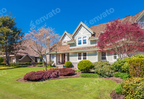 Preview: Beautiful Exterior Of Newly Built Luxury Home. Yard With Green Grass And Walkway Lead To Front
