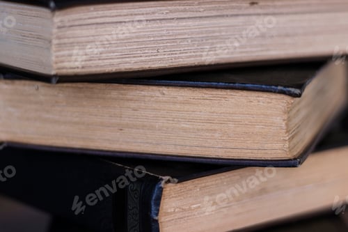 Preview: Stack Of Old Books With Rough Cut Deckle Edge Pages Selective Focus