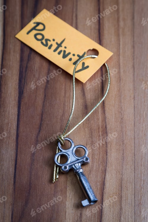 Preview: Concept For A Happy Life Using An Old Decorative Key And A Hand Written Tag Attached By A Golden