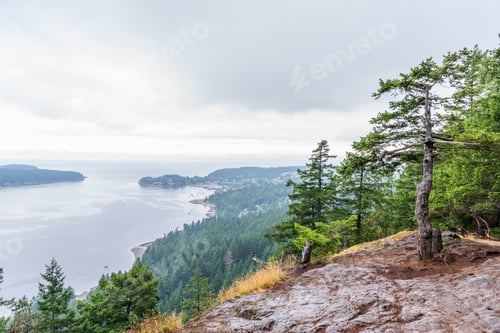 Preview: View At Mountain Lake With Dramatic Clouds In British Columbia, Canada.