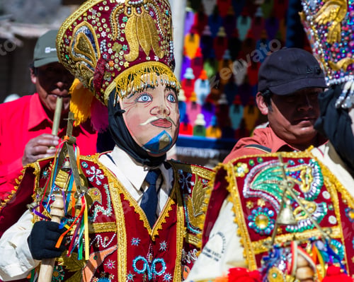 Preview: Ollantaytambo, Peru - May 16 : Religious Celebration For Fiestas De Pentecostes With People Wearing