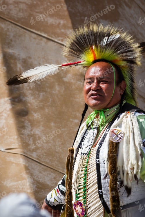 Preview: Crazy Horse Memorial, South Dakota - June 15 : Native American Performing For A Crowd In The Black