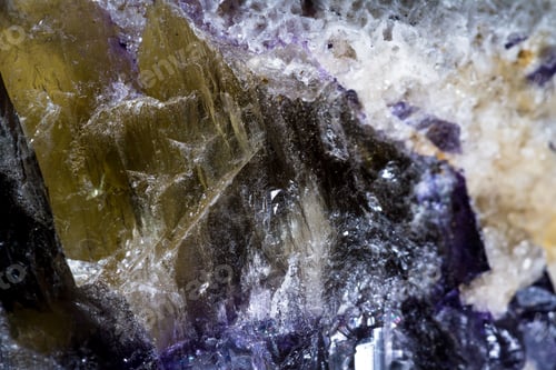 Preview: Close Up Of A Beutiful Piece Of Crystal With Dark Purples And Yellow With Clear Sections