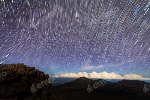 Preview: Stars Against The Dark Sky With Clouds Shot From The Summit Of Haleakala National Park And