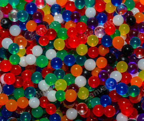 Preview: A Close Up View Of A Multicolored Background Of Tiny Beads.