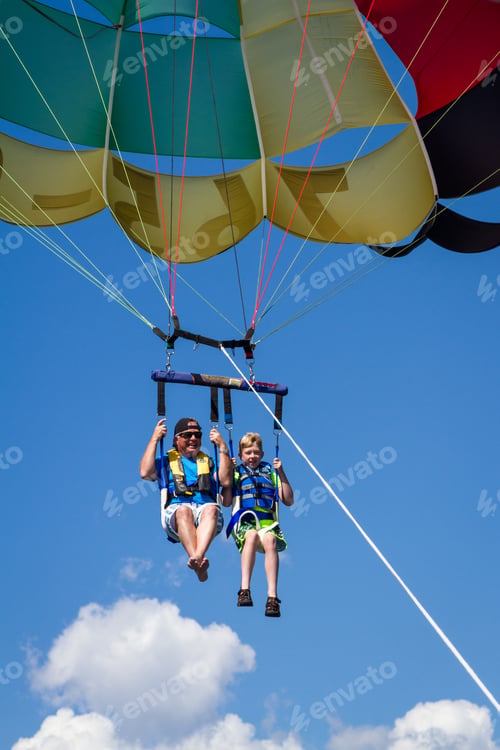 Preview: Coeur D' Alene, Idaho - August 12: Parasailing Adventure With People Enjoying The View. August 12