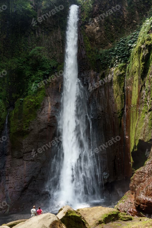 Preview: Tourist In La Fortuna Waterfall In A Forest, Alajuela Province, Costa Rica
