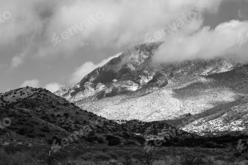 Preview: Snow And Cloud Capped Mountains In Black And White