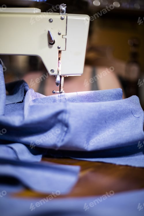 Preview: Woman Sewing