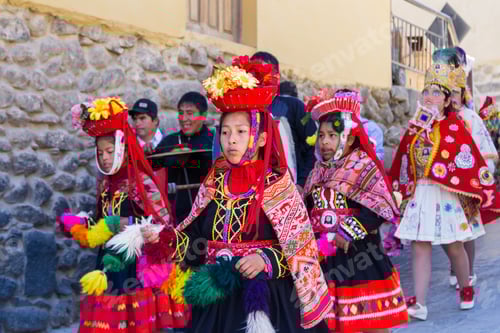 Preview: Ollantaytambo, Peru - May 16 : Religious Celebration For Fiestas De Pentecostes With People Wearing