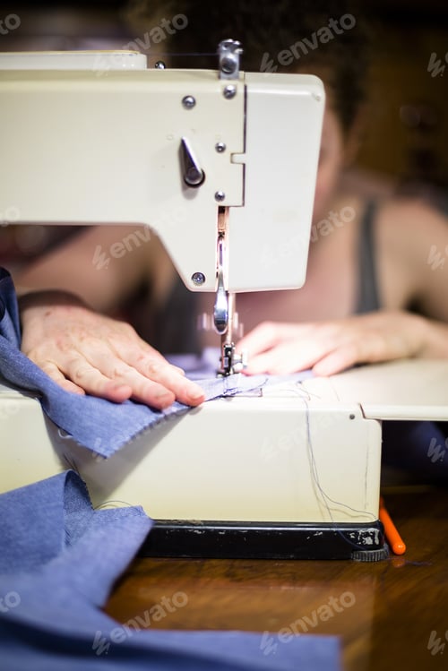 Preview: Woman Sewing