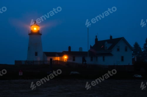 Preview: The Beams Of The Light Of The Pemaquid Point Lighthouse With Adjacent Buildings