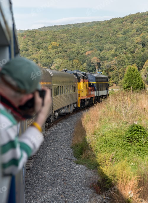 Preview: Photographer On Train Trip Up Valley