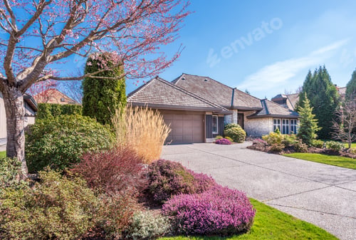 Preview: Beautiful Exterior Of Newly Built Luxury Home. Yard With Green Grass And Walkway Lead To Front