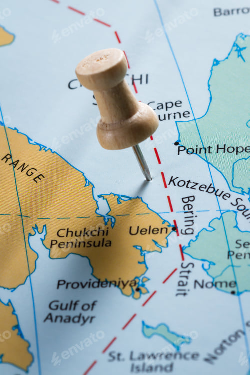 Preview: Close Up Of Map With The Words Bering Sea In Focus With A Push Pin Marking The Spot