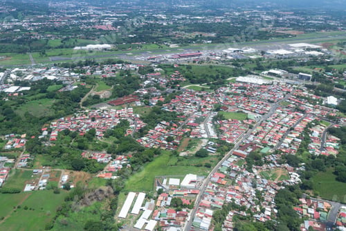 Preview: San Jose, Costa Rica - May 24 : Aerial View Of The City Of Alajuela From The Interior Of A Small