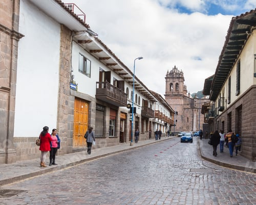Preview: Cusco, Peru - May 12 : People Walking To And From The Plaza De Armas With A Side View Of The