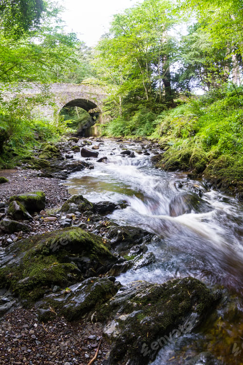 Preview: Banvie Bridge Near Pitlochry In The Scottish Highlands As The Fresh Water Water Runs Downstream