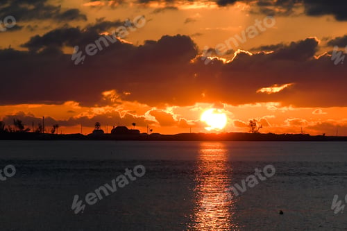 Preview: The Sun Rising Over Hutchinson Island With The House Of Refuge In The Background