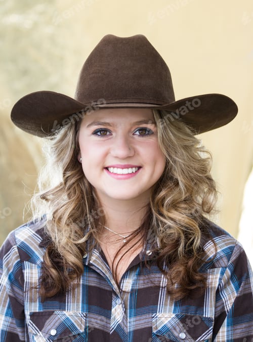 Preview: Portrait Of A Young Teenager Wearing Classic Western Clothes Including A Cowboy Hat