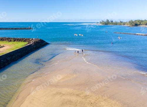 Preview: Aerial Shot Of Traditional Hawaiian Canoes In The Ocean Off The North Shore Town Of Haleiwa