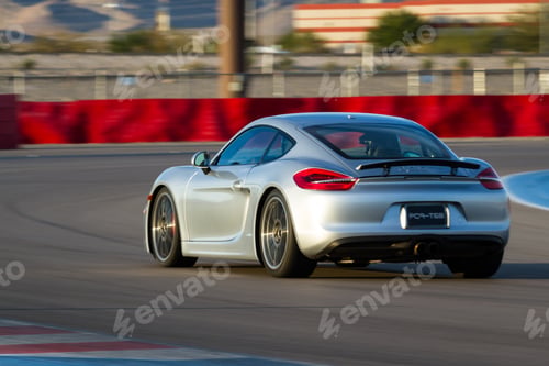 Preview: Las Vegas Nevada - December 09 : Porsche Cayman S Going Around The Track At The Las Vegas Motor